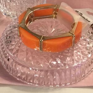 $12 ea. or 3/$25. Cantelope-colored Acrylic and Goldtone Geometric Bracelet